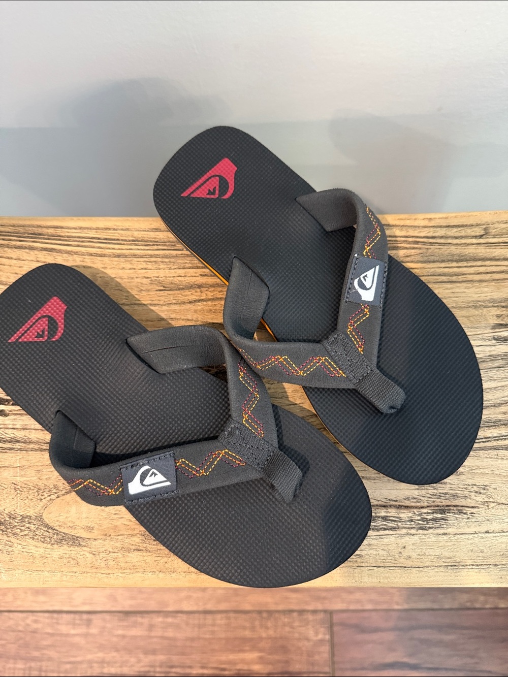 Quiksilver Molokai Black Flip Flops with Red Logo and Multicolor Stitching